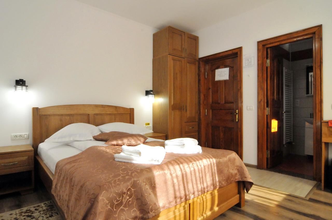 Гостевой дом Pensiunea Manidum Буштени-33