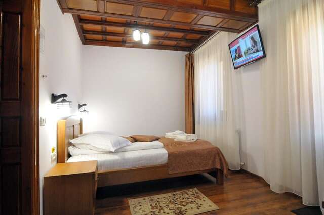 Гостевой дом Pensiunea Manidum Буштени-19