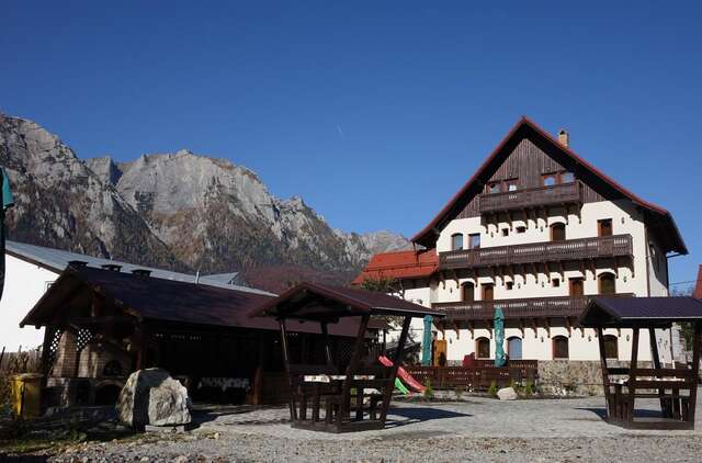 Гостевой дом Pensiunea Manidum Буштени-5