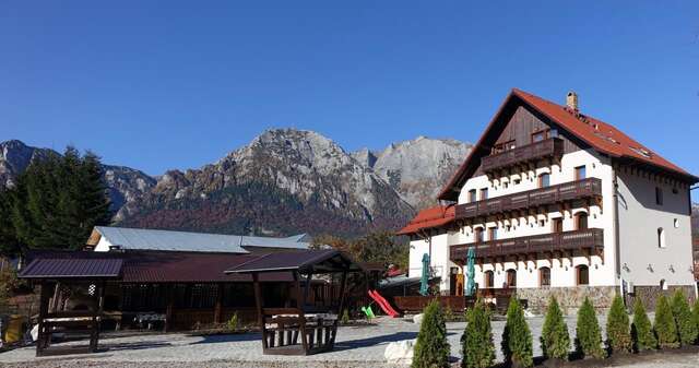 Гостевой дом Pensiunea Manidum Буштени-6