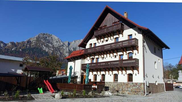 Гостевой дом Pensiunea Manidum Буштени-7